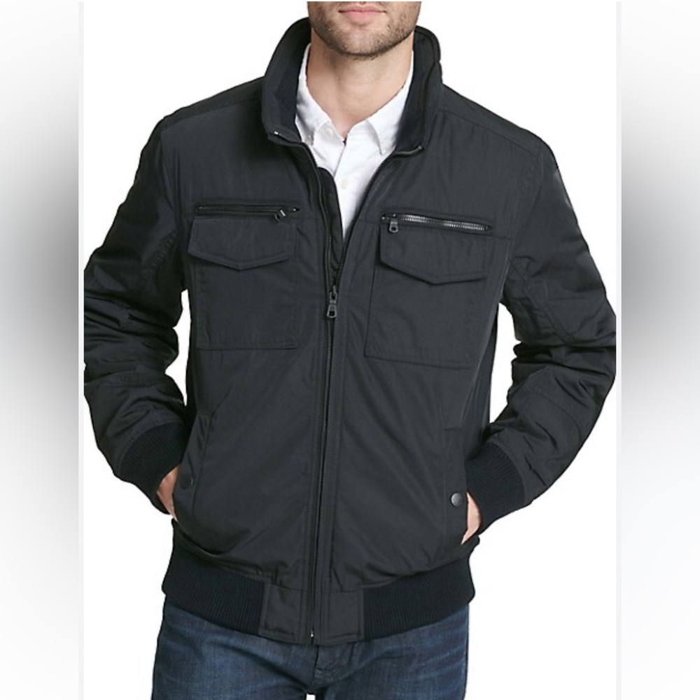 NWOT. Tommy Hilfiger extreme cold winter coat . Dress up/down.Tons of storage .
